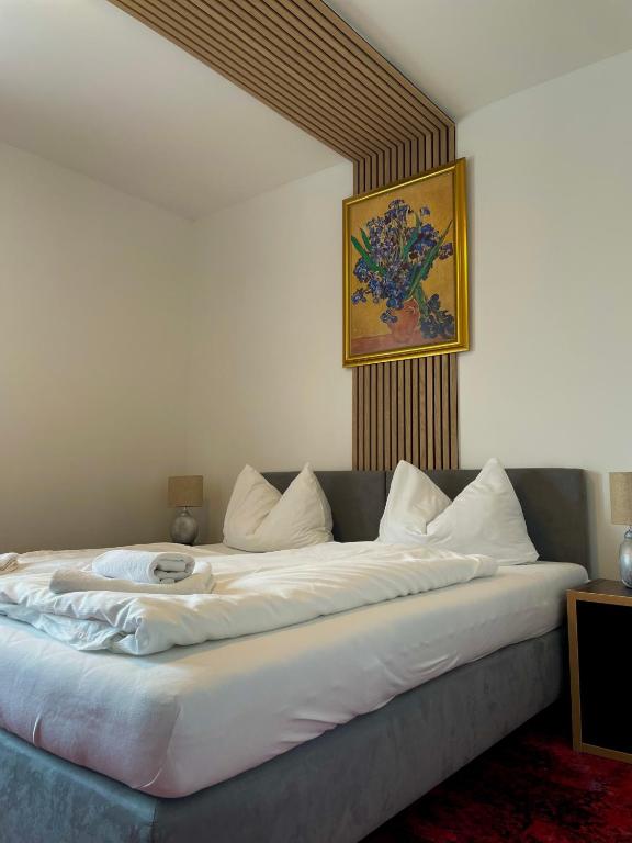 Postel nebo postele na pokoji v ubytování Hotel-Restaurant Moser Pöchlarn