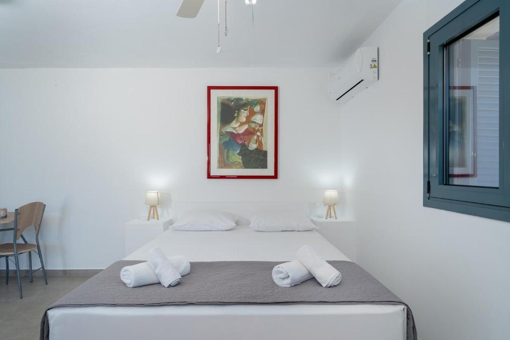 Postel nebo postele na pokoji v ubytování Melie Boutique by A&D Properties