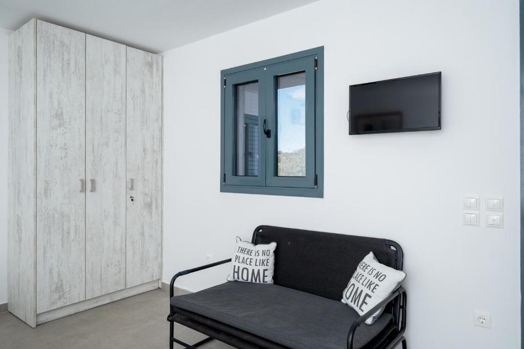 TV a/nebo společenská místnost v ubytování Melie Boutique by A&D Properties