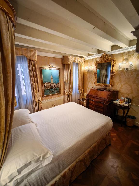 Postel nebo postele na pokoji v ubytování Canal Grande