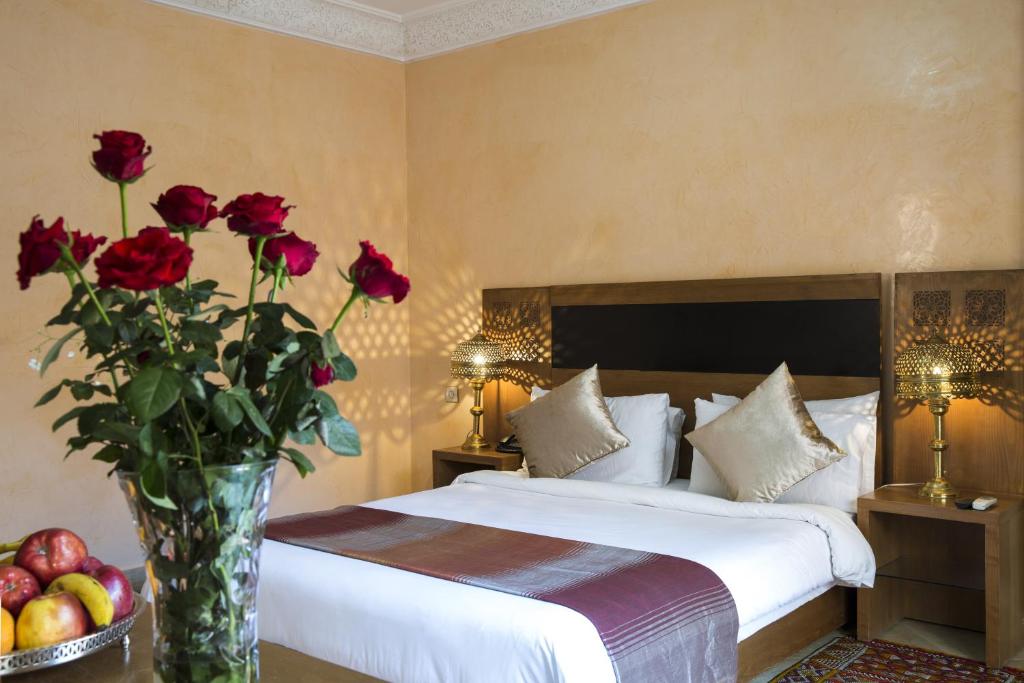 Postel nebo postele na pokoji v ubytování Marrakech House