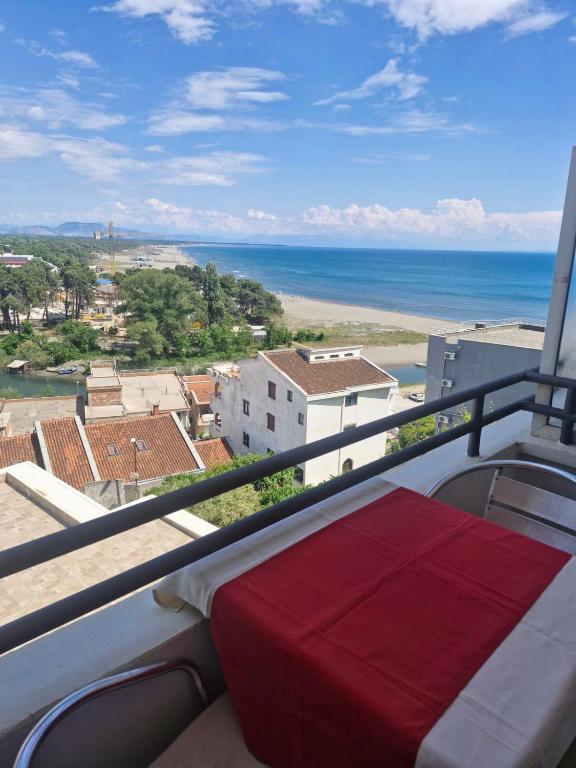 a balcony with a view of the ocean at Aparments Plaza in Velika Plaža