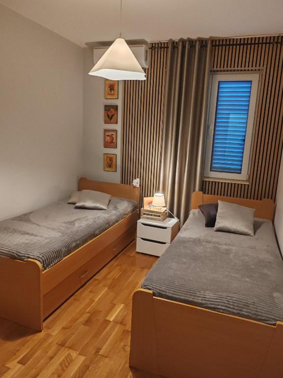 Postel nebo postele na pokoji v ubytování La vita e bella