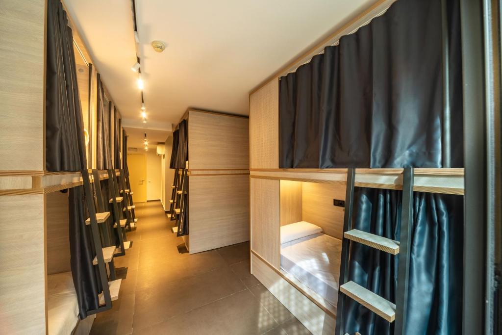 Postel nebo postele na pokoji v ubytování GG Hostel