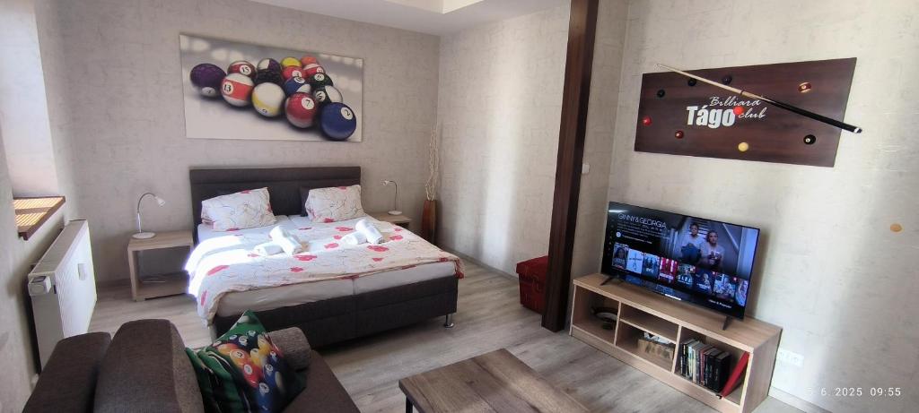 Postel nebo postele na pokoji v ubytování Apartmany Rudolf