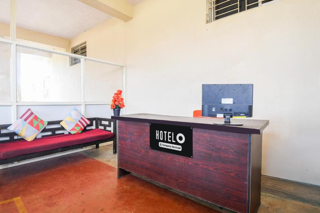 Postel nebo postele na pokoji v ubytování Super Hotel O Dumduma Near DN Regalia Mall