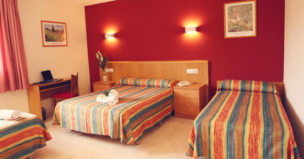 
Cama o camas de una habitación en Hotel Europa de Figueres
