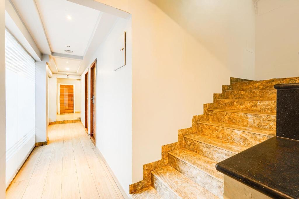 Fotografie z fotogalerie ubytování Super Townhouse Oak Kodambakkam Formerly Cine City v destinaci Čennaí