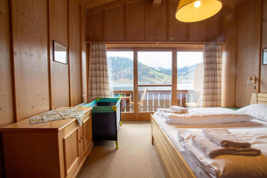 Posteľ alebo postele v izbe v ubytovaní Waterfront Apartments Zell am See - Steinbock Lodges
