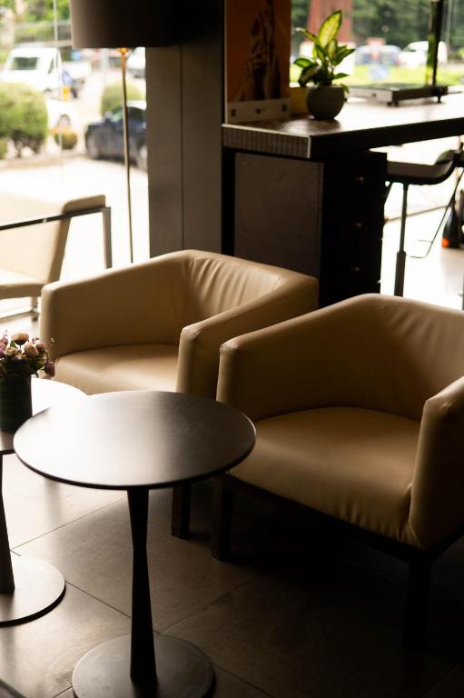 Posezení v ubytování Axolute Comfort Hotel Como Cantù