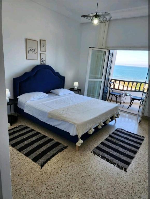 Postel nebo postele na pokoji v ubytování Blue view appartement