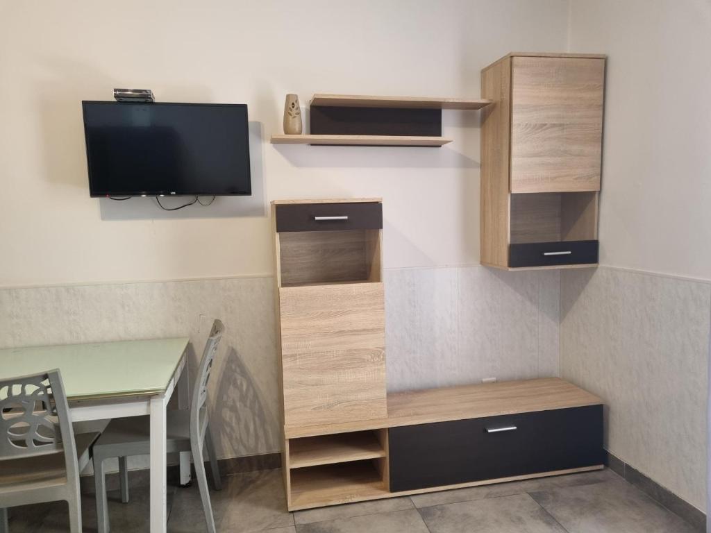 TV a/nebo společenská místnost v ubytování Central Suites