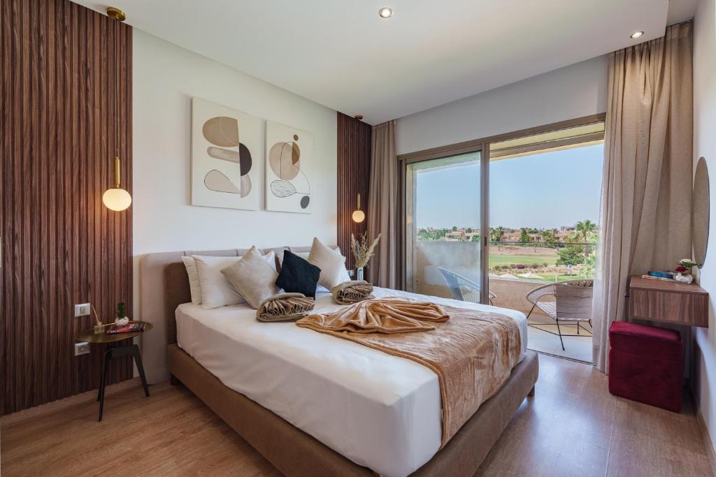 Postel nebo postele na pokoji v ubytování Alma Prestigia Appartments