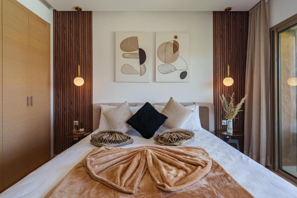 Postel nebo postele na pokoji v ubytování Alma Prestigia Appartments