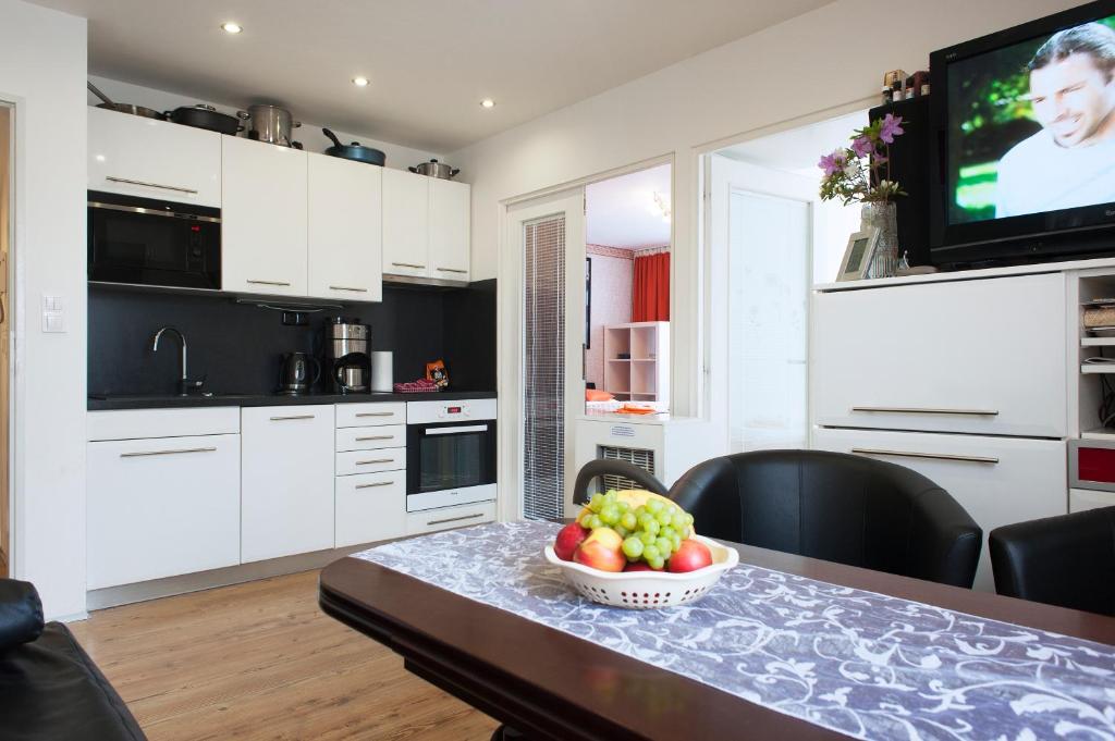 Kuchyň nebo kuchyňský kout v ubytování Best Residence Expo