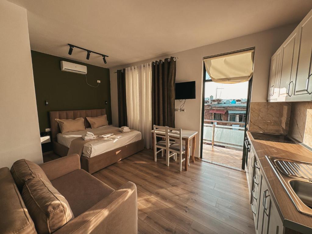 Postel nebo postele na pokoji v ubytování Relaxx Apartment & Hotel