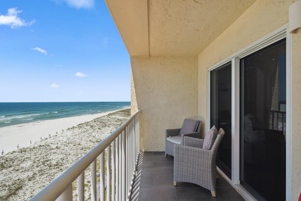 a balcony with a view of the beach at Sans Souci Unit 309 in Pensacola Beach