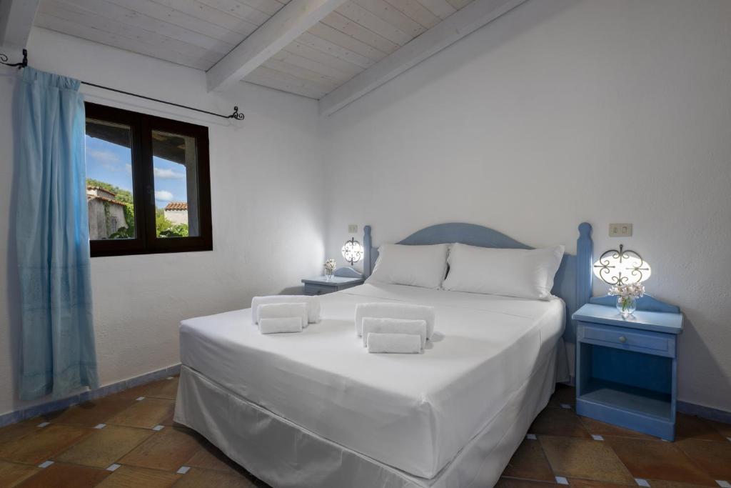 Postel nebo postele na pokoji v ubytování AHR Altura Hotel Porto Rafael