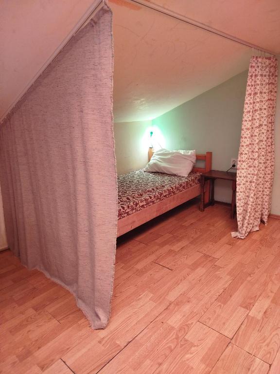 Postel nebo postele na pokoji v ubytování Just a Hostel