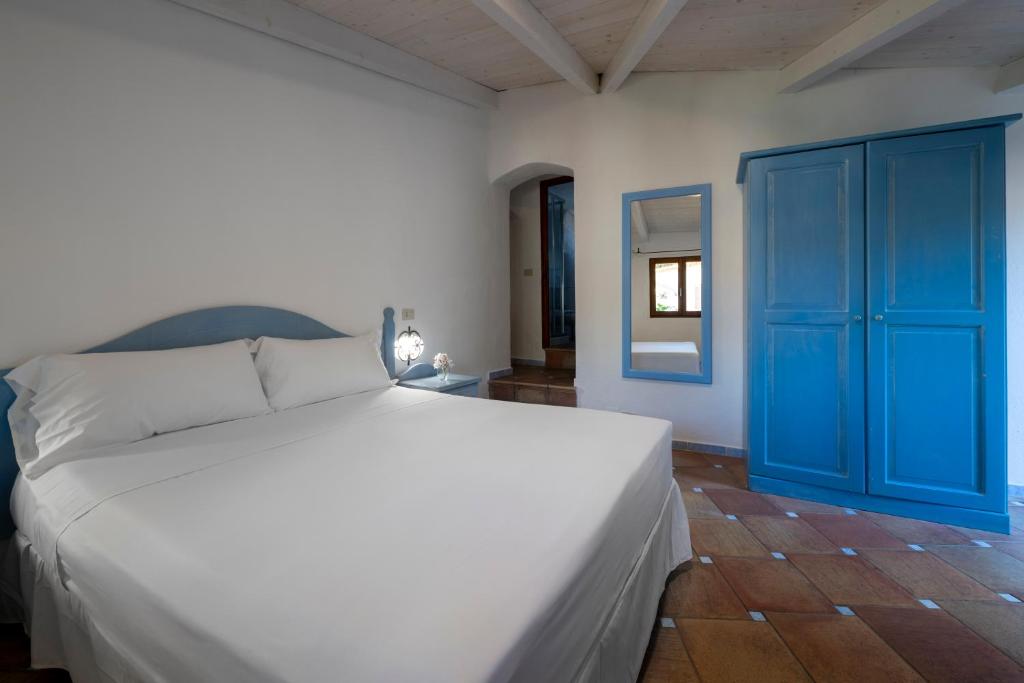 Postel nebo postele na pokoji v ubytování AHR Altura Hotel Porto Rafael