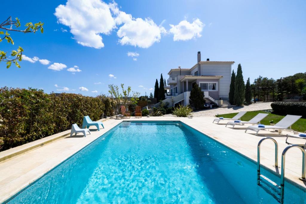 Πισίνα στο ή κοντά στο Villa Abelos