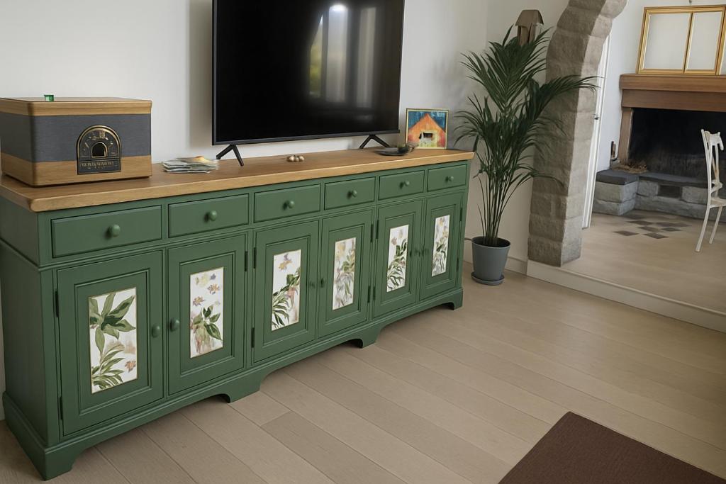 TV a/nebo společenská místnost v ubytování B&B Il Fiore nel Bosco