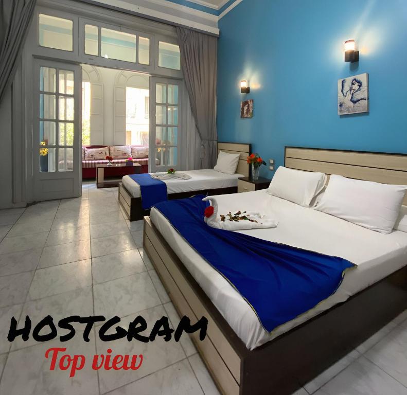 Postel nebo postele na pokoji v ubytování Hostgram Top View