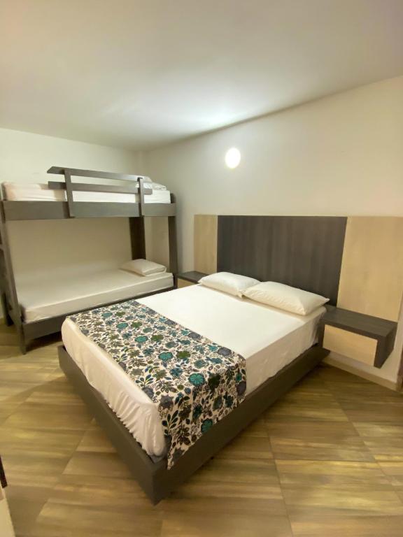Postel nebo postele na pokoji v ubytování Hotel La Bastida