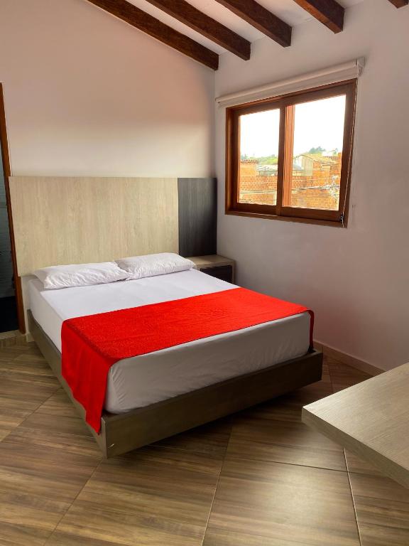 Postel nebo postele na pokoji v ubytování Hotel La Bastida