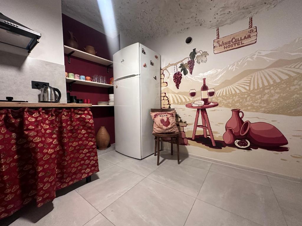 Kuchyň nebo kuchyňský kout v ubytování Wine Cellar Hostel