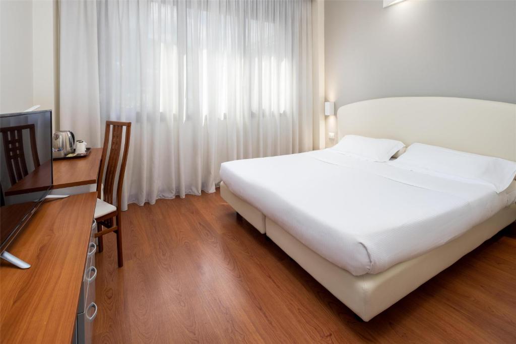 Łóżko lub łóżka w pokoju w obiekcie Best Western Air Hotel Linate