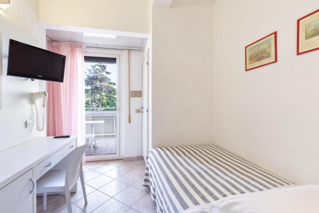Postel nebo postele na pokoji v ubytování Hotel Sole