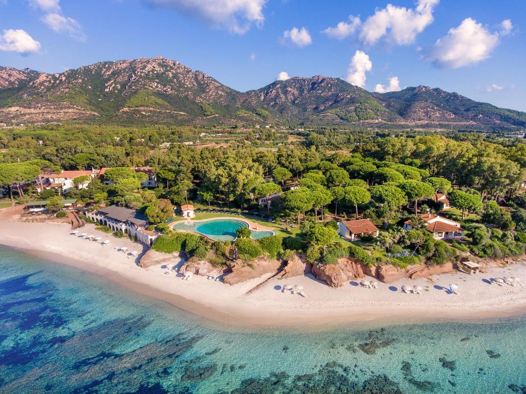 an aerial view of a resort on a beach at Luna Sardinia in Santa Margherita di Pula