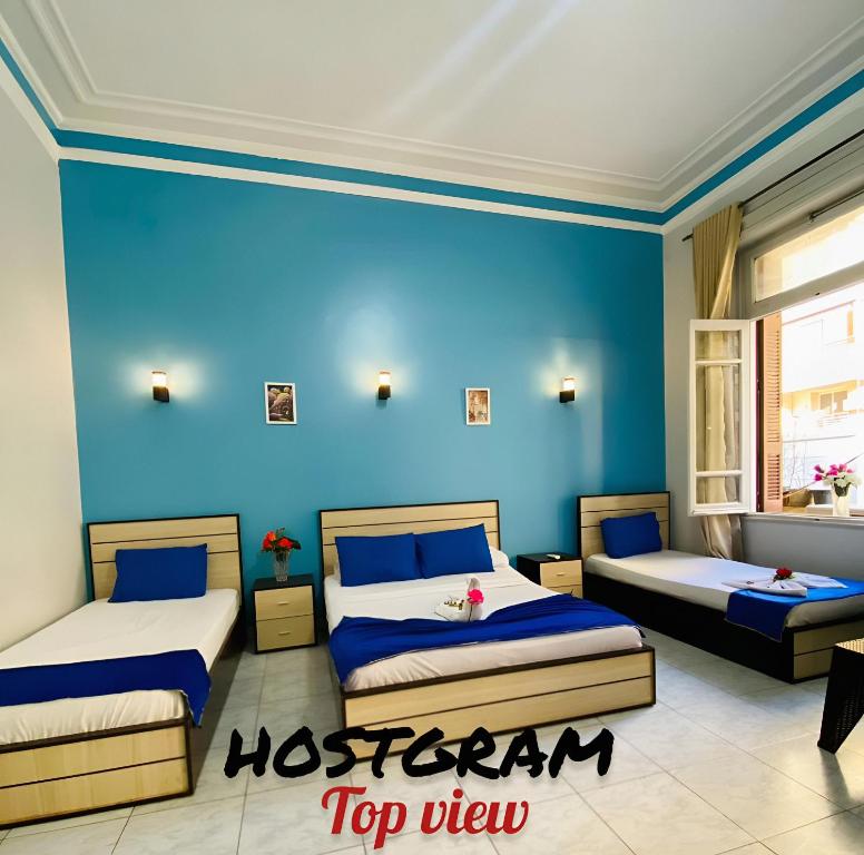 Postel nebo postele na pokoji v ubytování Hostgram Top View