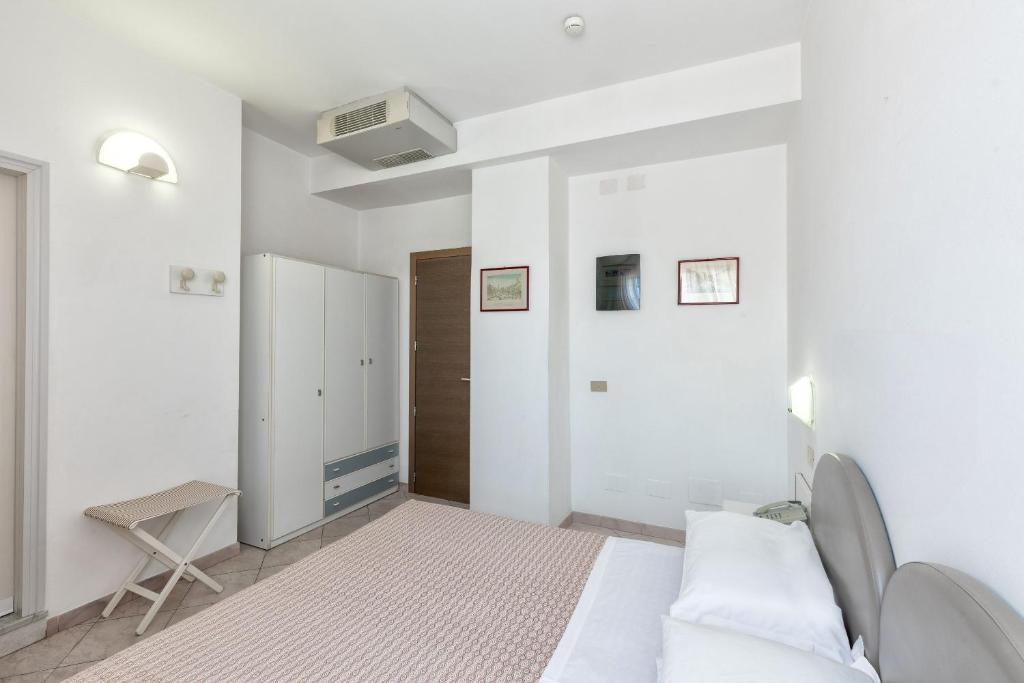 Postel nebo postele na pokoji v ubytování Hotel Sole