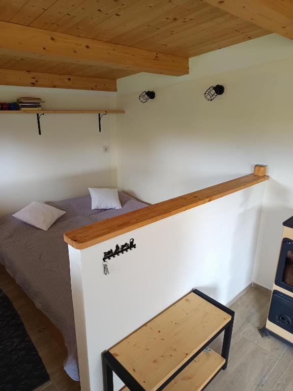 Postel nebo postele na pokoji v ubytování CHata u Klofana