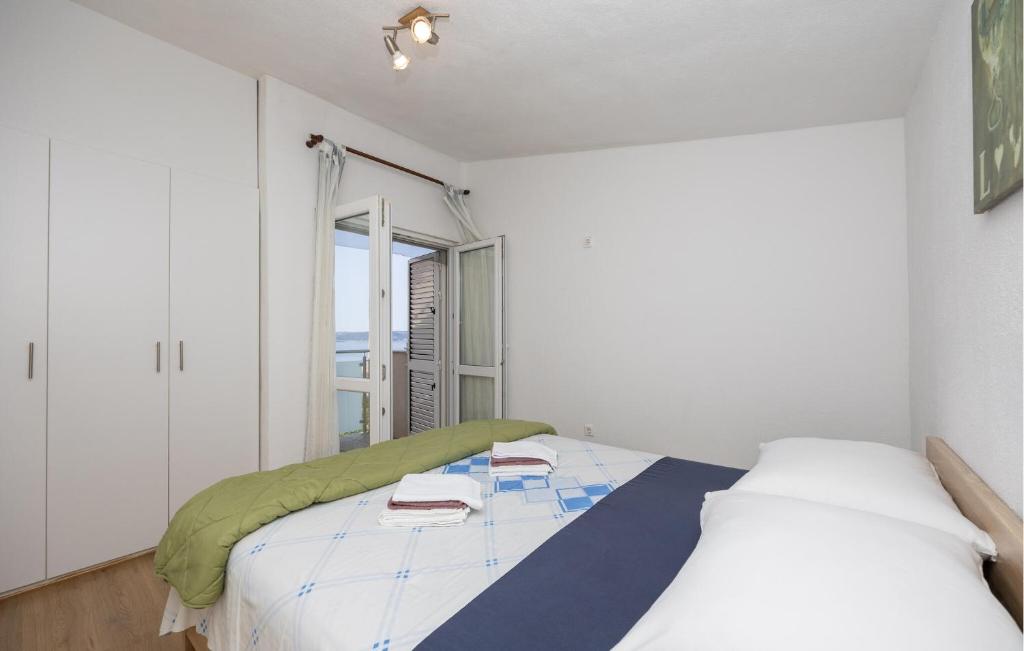 Posteľ alebo postele v izbe v ubytovaní Pet Friendly Home In Kastel Kambelovac
