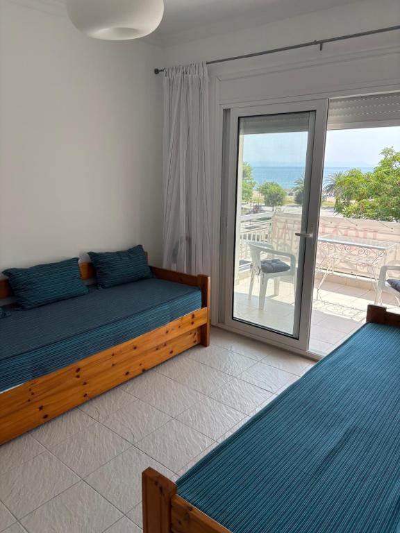 Ένα ή περισσότερα κρεβάτια σε δωμάτιο στο selana sea sunrise view