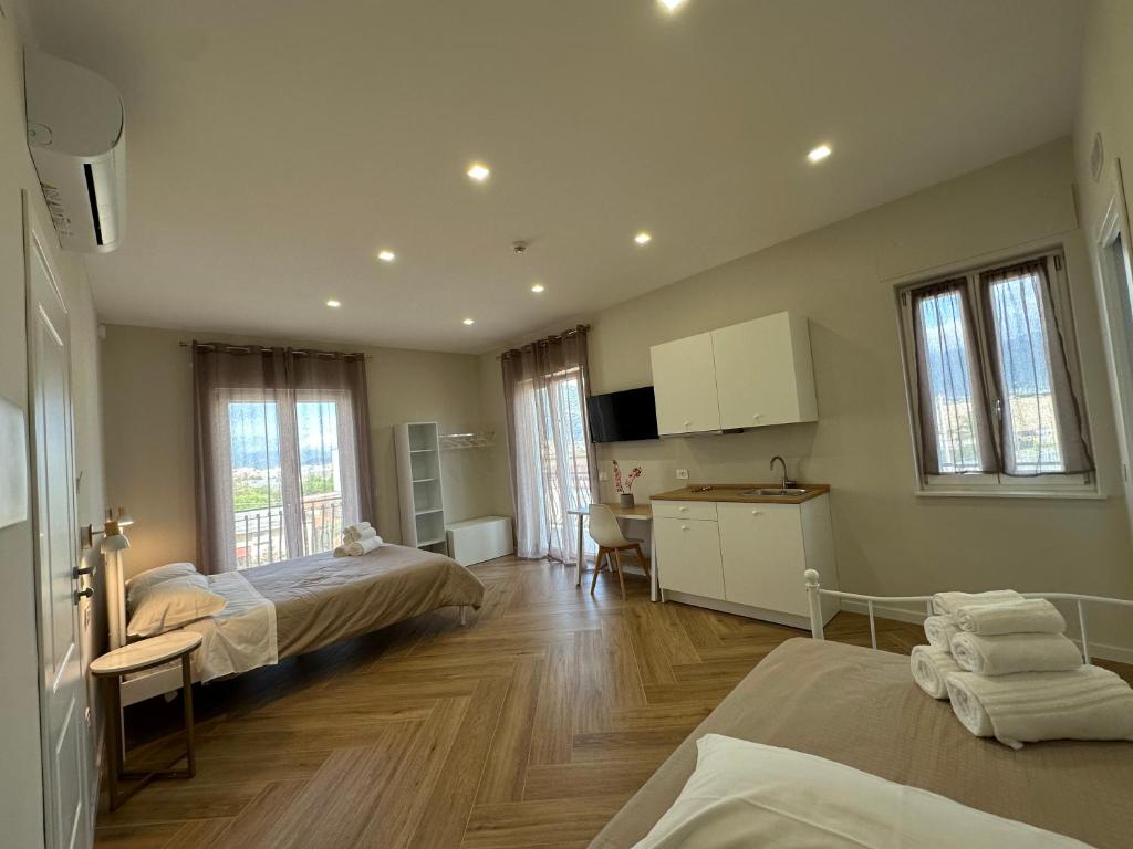 Una cama o camas en una habitación de Le Muse Pompei B&B