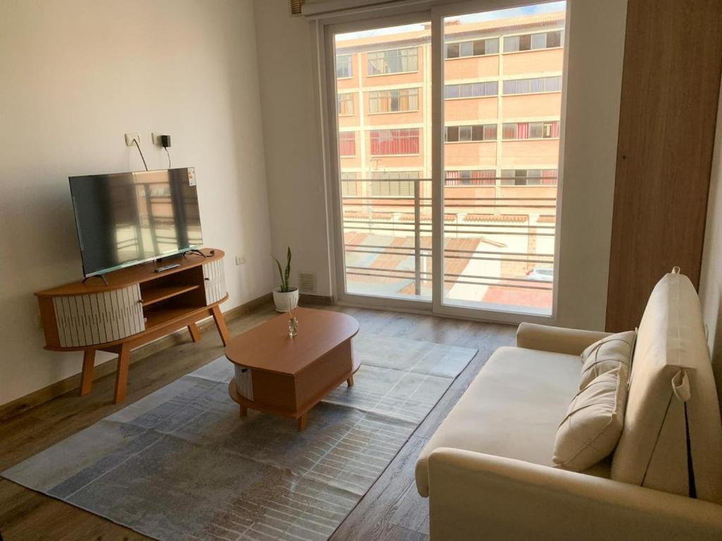 Et tv og/eller underholdning på Modern apartment in Sucre