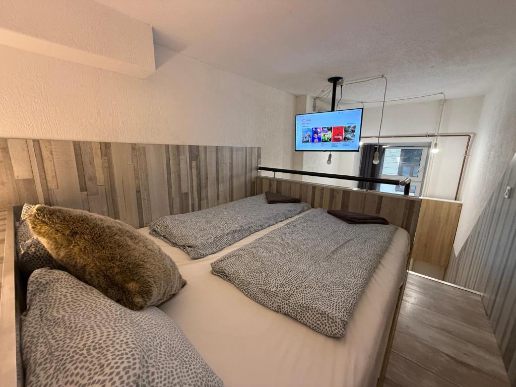 Posteľ alebo postele v izbe v ubytovaní KM33 Apartments - Budapest - hostAID