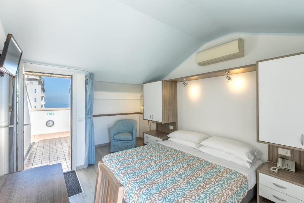 Postel nebo postele na pokoji v ubytování Hotel Sole