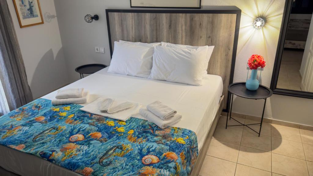 Posteľ alebo postele v izbe v ubytovaní Aliston Hotel Thassos