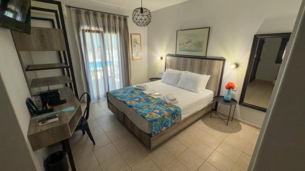 Posteľ alebo postele v izbe v ubytovaní Aliston Hotel Thassos