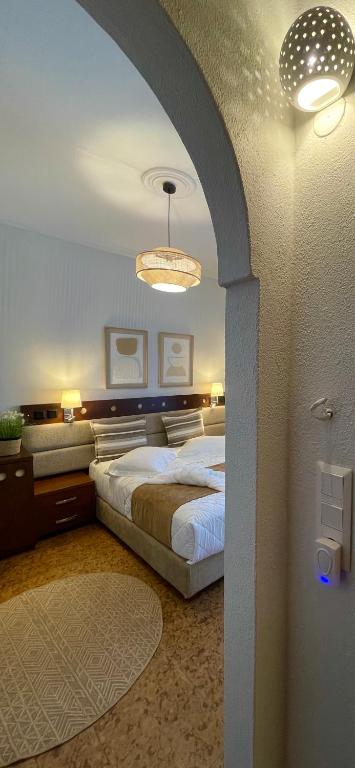 Postel nebo postele na pokoji v ubytování Semiramis Guesthouse