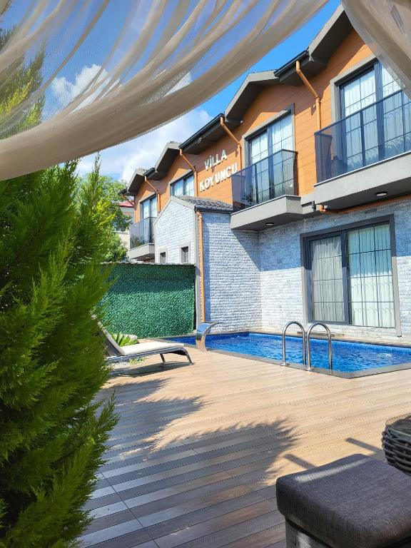 a view of a house with a swimming pool at Villa Da London in Dalaman