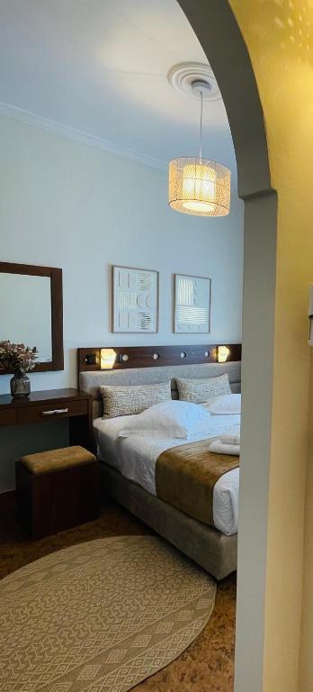 Postel nebo postele na pokoji v ubytování Semiramis Guesthouse