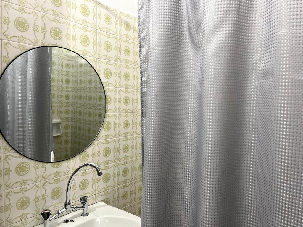 Koupelna v ubytování Nopi Rooms