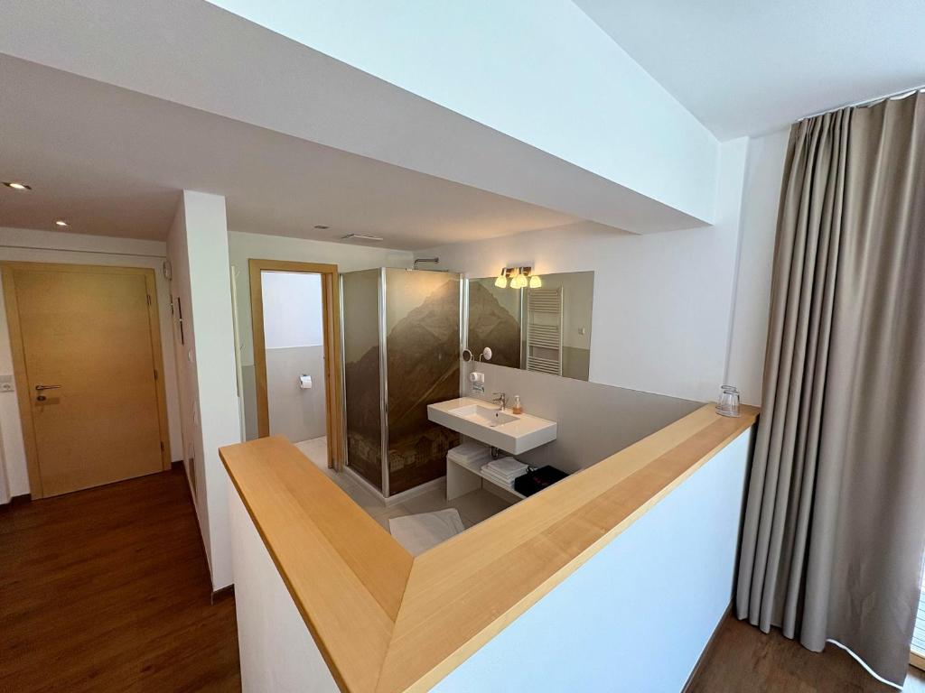 Koupelna v ubytování Garni Apparthotel St Valentin