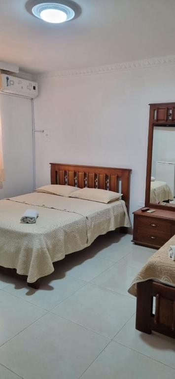 Ένα ή περισσότερα κρεβάτια σε δωμάτιο στο Hotel Makai SAS